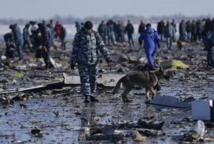 Emergencies Ministry members work at the crash site of a Boeing 737-800 Flight FZ981 operated by Dubai-based budget carrier Flydubai, at the airport of Rostov-On-Don, Russia, March 20, 2016. REUTERS/Maxim Shemetov